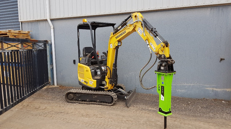 Yanmar VIO17 mini excavator equipped with an Impact Attachments hydraulic breaker, perfect for compact demolition and excavation tasks in tight spaces