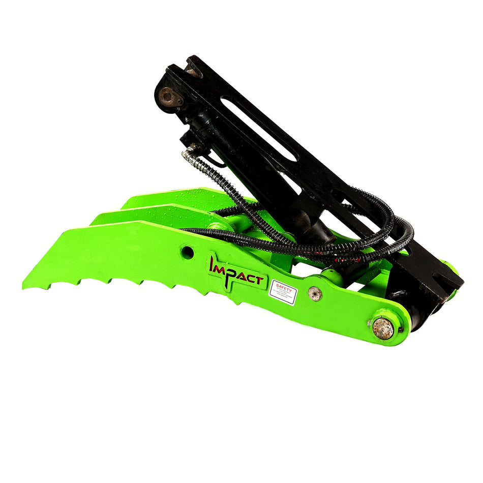 Close-up of an Impact Attachments hydraulic thumb in bright red, mounted on an excavator arm. The hydraulic thumb features a serrated edge designed for gripping and handling materials efficiently. The attachment is equipped with high-quality hydraulic fittings and hoses for optimal performance. Ideal for excavation and material handling tasks, this heavy-duty attachment showcases the durability and precision engineering of Impact Attachments.