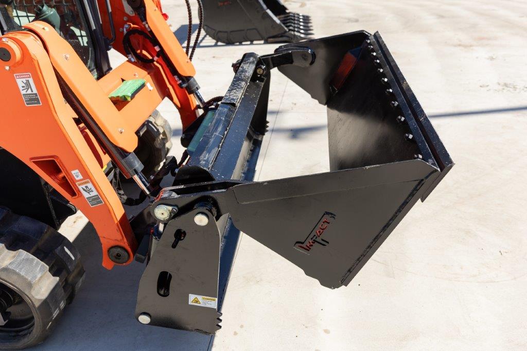 Kubota SVL75-2 track loader equipped with an Impact 4 in 1 bucket attachment, ideal for versatile excavation, material handling, and construction tasks.