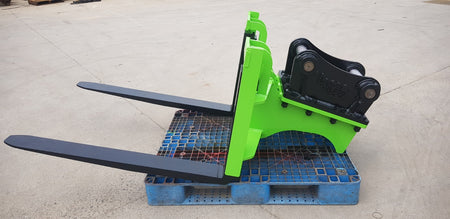 Impact Attachments pallet forks designed for efficient lifting and transporting of materials on construction sites